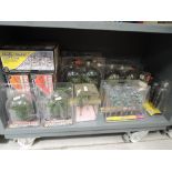 A shelf of Woodland Scenics and similar HO scale Trees, various, all boxed or on card