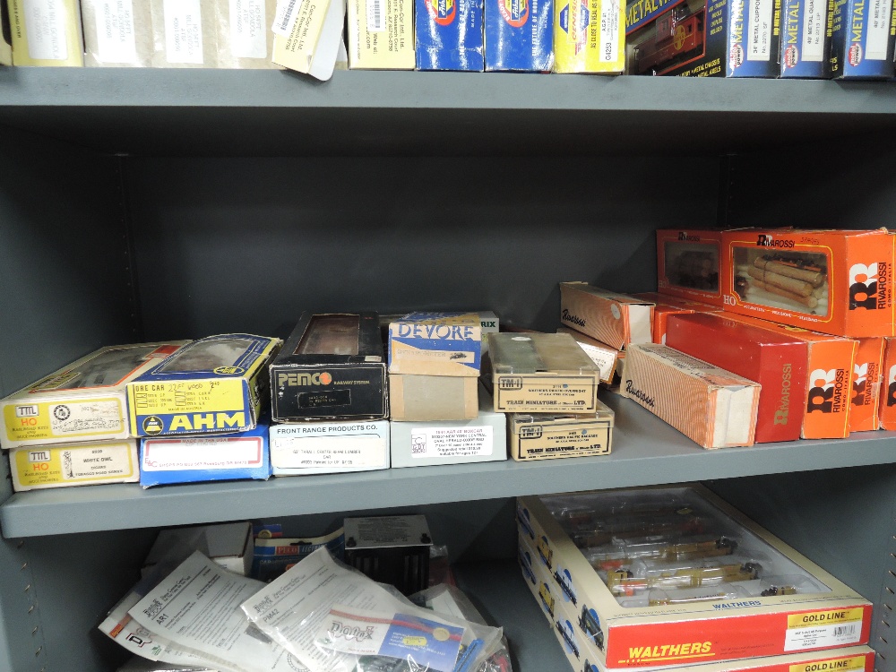 A shelf of RivaRossi, AHM, Penco, Devore and similar HO scale rolling stock items, all boxed,