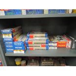 A shelf of twenty six Walthers HO scale rolling stock items, all boxed
