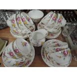 A vintage part tea service by New Chelsea