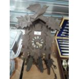 A vintage wooden cuckoo clock