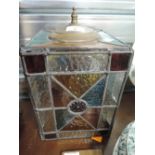 A vintage leaded light with colour and mottled glass