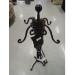 A vintage fire side companion set and wrought iron stand