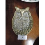 A vintage brass cast trinket dish in the design of an owl