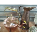 A vintage copper stove kettle and hand worked jug