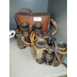 Two vintage pairs of binoculars including Taylor Hobson 1941 Mkii military