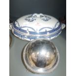 A vintage silver plate footed and domed salt dish and ceramic tureen