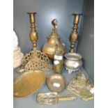 A selection of vintage brass wares including ink well and candle sticks