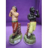 Two vintage Staffordshire flat back figures of boxers Tom Cribb and Tom Moly Neux