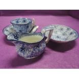 A selection of vintage miniature ceramics with a chintz design, cream jug tea cup and saucer