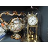 A vintage ceramic table centre or censor in a Majolica design and domed brass anniversary clock