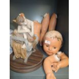 A vintage dismembered doll markd FP 23c and Clarecraft figure