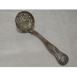 A Victorian Scottish silver sugar sifter spoon in the Kings pattern having pierced bowl and