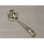 A Victorian silver sauce spoon of plain form bearing eagle monogram to terminals, London 1898,