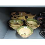 A selection of vintage Marks and Spencer bowls and pig sign