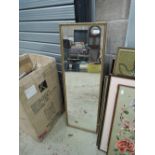 A gilt frame wall mirror