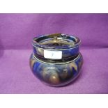 A vintage earthen ware tobacco smokers jar with marble blue glaze