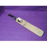 A miniature Lords Cricket Ground cricket bat bearing signatures, Mike Gatting included