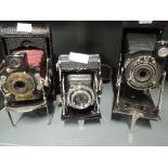 Three folding cameras. A Kodak Pocket Automatic, A No1A and Zeiss Ikon Compur Rapid