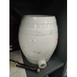 A vintage ceramic white glaze spirit or similar barrell
