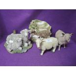 A selection of vintage sheep figures and decorations