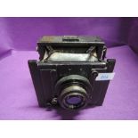 An early folding box camera C P Goerz with Carl Zeiss Jena Tessar lens