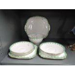A vintage part tea service by Taylor and Kent with green print