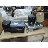 A steepletone hifi, JVC video player and slate table lamp