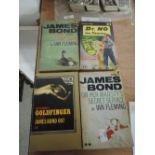 A selection of vintage James Bond books from the PAN library including Goldfinger