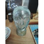 A vintage blue glass figural head