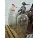 Two vintage advertising soda water bottles for Jonas Alexander Kendal