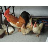 A family of vintage chickens including large rooster figure