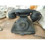 A vintage bakelite telephone reciever