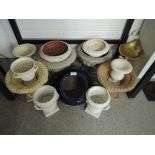 A selection of vintage ceramic and similar planters and display stands