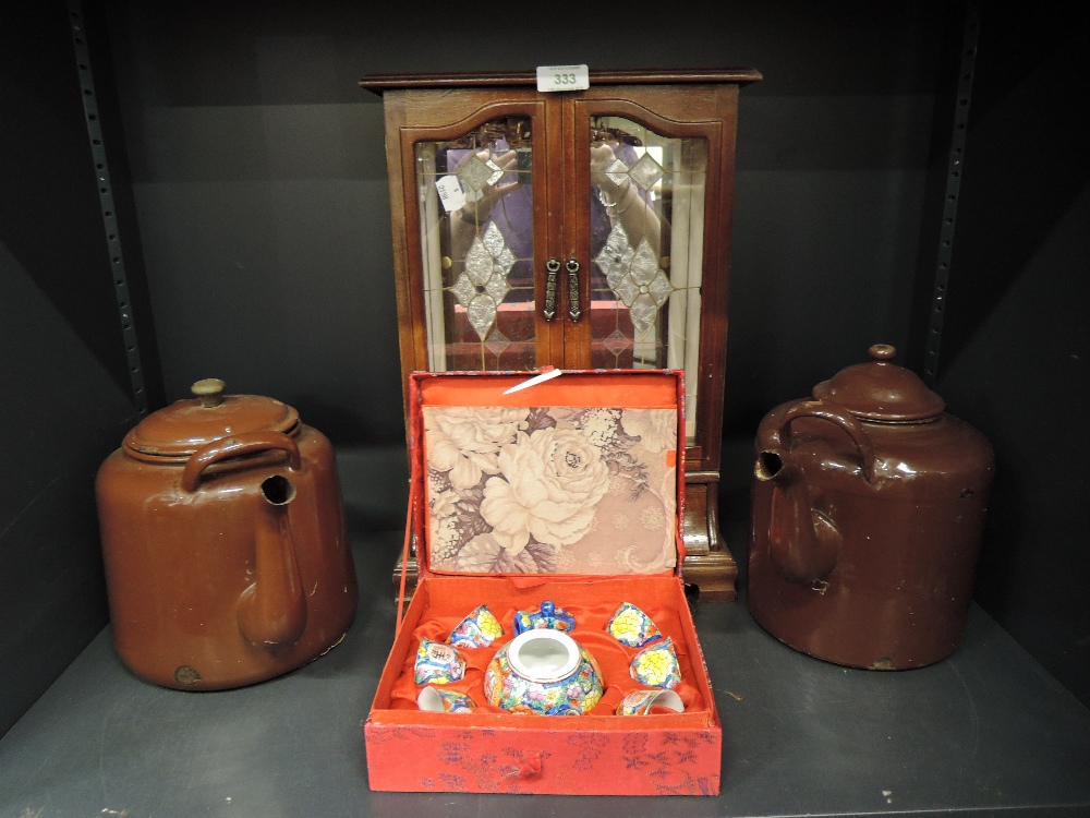 Two large utilitarian enamelled tea pots, a Chinese tea set and jewellery box