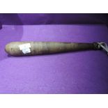 A vintage treen wood police style batton or truncheon