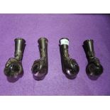 A set of four cast iron claw feet with glass ball