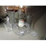 A selection of clear cut crystal glass wares including footed and etched bowl