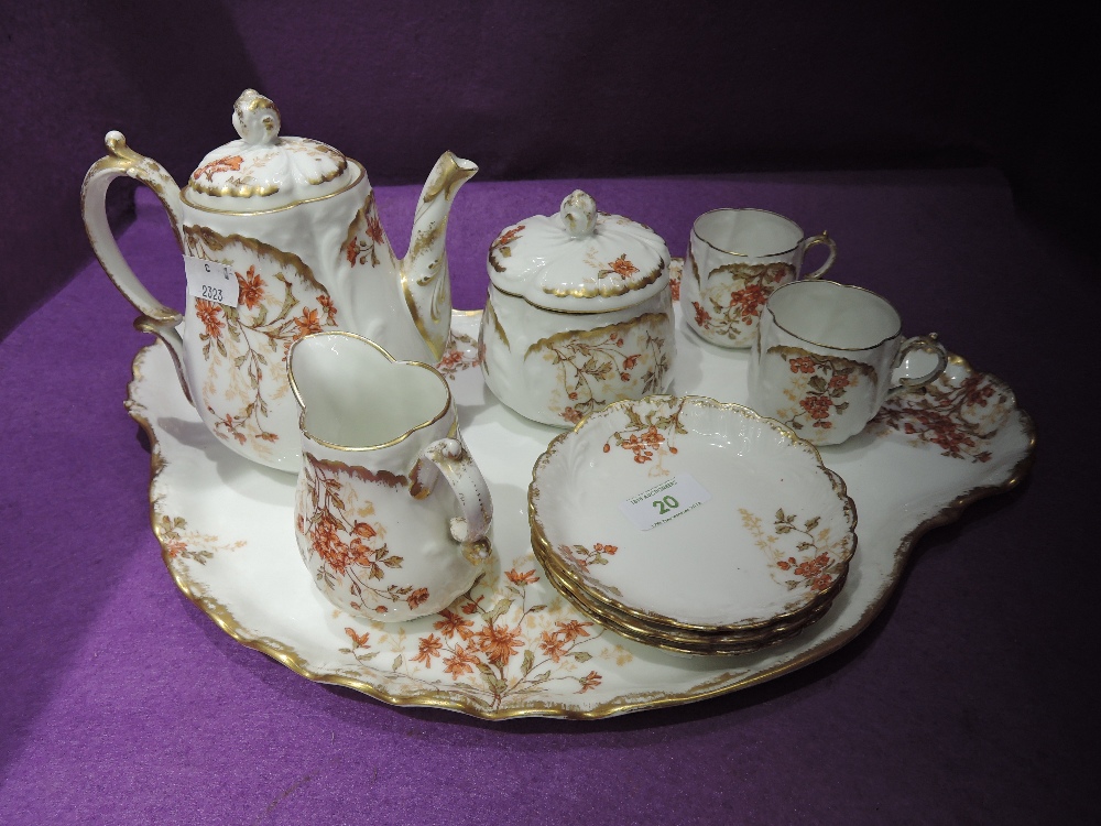 A vintage ceramic tea for one service by Limoges France