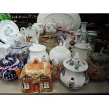 A selection of ceramic tea and coffee pots including Ringtons and hand decorated