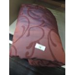 A decorative throw/bedspread of poly cotton swirl design