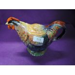 A vintage novelty teapot modelled as a Rooster, reg num 81073