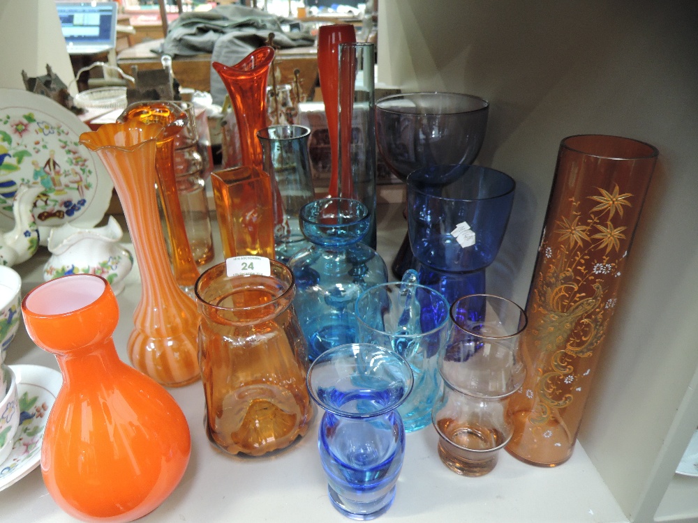 A selection of art glass, including nine pieces of orange and eight of blue etc