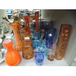 A selection of art glass, including nine pieces of orange and eight of blue etc