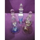 A selection of colour scent or perfume bottles some hand blown