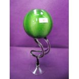 A modernised Art glass ornament modelled as green globe vase on twist stem