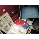 A collection of ephemera in suitcase including diaries, photograph albums 1900-1950s