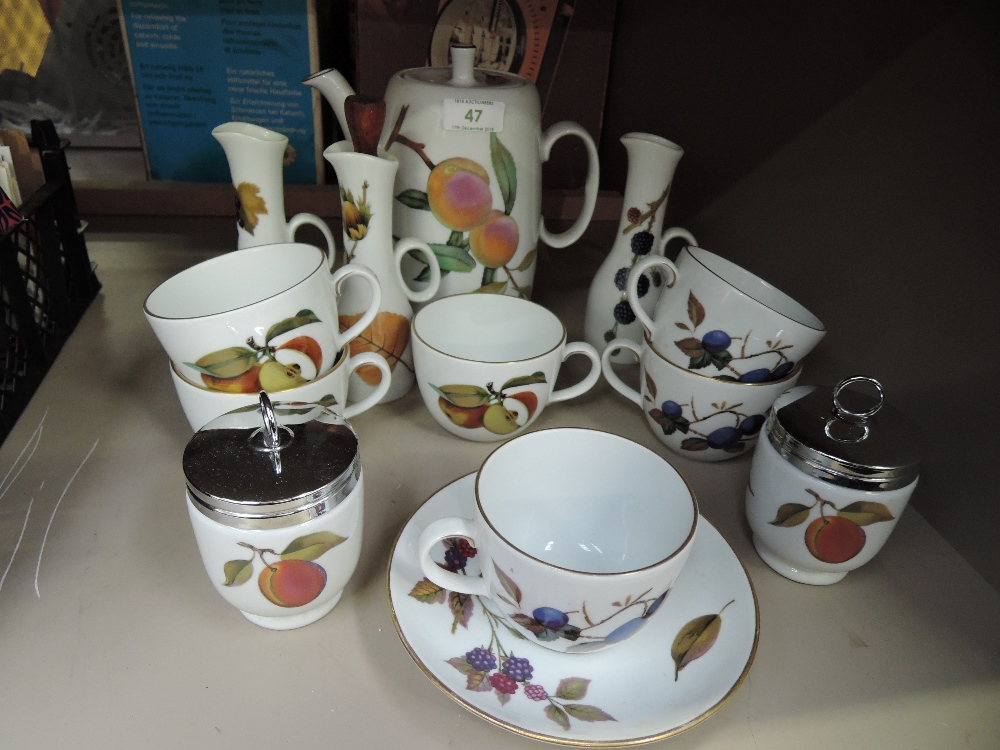 A selection of Royal Worcester ware in the Evesham pattern including coffee pots, egg coddlers,