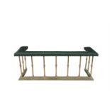 A VICTORIAN BRASS FRAMED CLUB FENDER, of rectangular shape, upholstered in green hide and