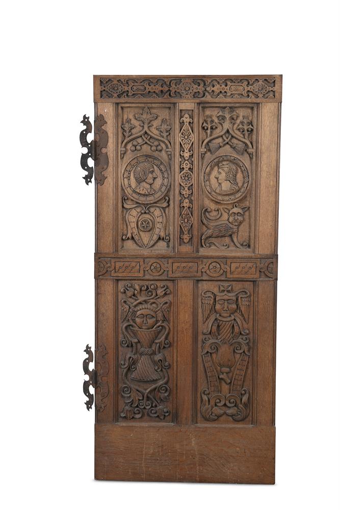 A CONTINENTAL 18TH CENTURY CARVED OAK DOOR PANEL, left hanging, with four long fielded panels